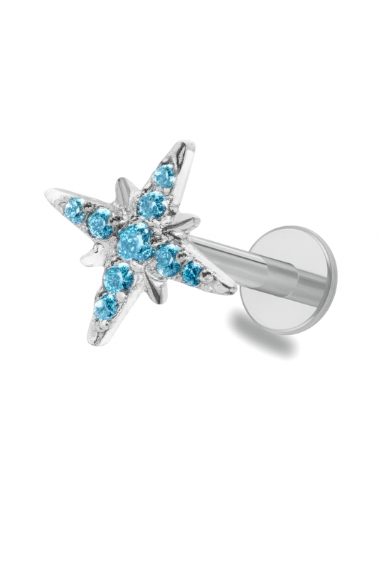 עגיל פירסינג טטניום בצורת כוכב בשיבוץ זירקונים כחולים